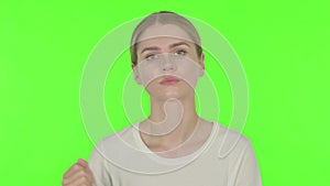 Angry Young Woman Arguing on Green Background