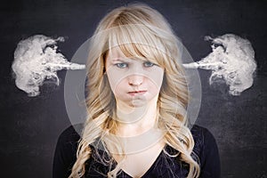 Angry young woman, blowing steam coming out of ears