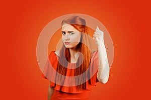 Angry young woman, holding fist up about to punch