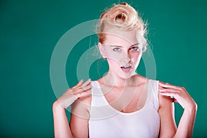 Angry young woman with pin up hair