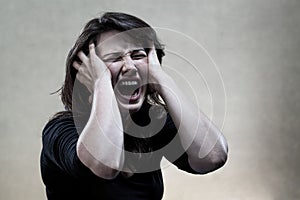 Angry young woman shouting