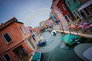 Angular view of Bruno Island's colorful houses and canal, Venice, Italy