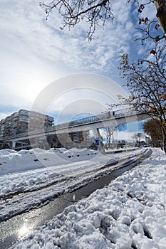 Angular view of an A2 highway bridge with snow, a sunny day, Madrid, Spain, Europe, January 10, 2021, photo