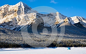 Anice fishing tent set up on a Canadian Rockies lake