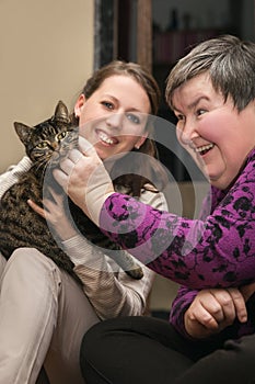 Animal assisted therapeutic for a disability develop woman photo