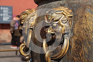 The animal mask on the copper vat in forbidden city