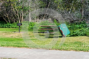 Animal proof trash receptacle in public park