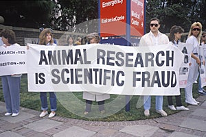 Animal rights demonstrators holding signs