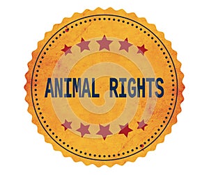 ANIMAL-RIGHTS text, on vintage yellow sticker stamp.