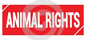 ANIMAL RIGHTS text written on red stamp sign