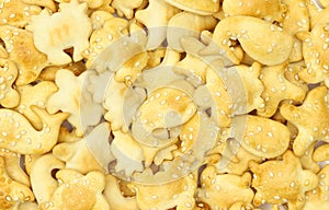 Animal shaped sesame sprinkled crackers full texture background