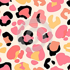 Animal skin print in 90s style. Colorful leopard spot seamless pattern design