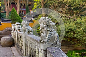 Animal statue on the handrail of the bridge to Fayu temple in the Putuoshan mountains, Zhoushan Islands,  a renowned site in