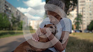 Animal theme is a lonely old woman best friend. Caucasian 90 years old senior female is happy to spend time with her pet photo