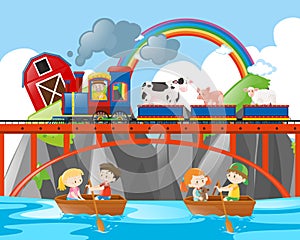 Animals riding on train and kids rowing boats