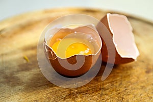 Chicken eggs and yellow yolk isolated on white background. photo