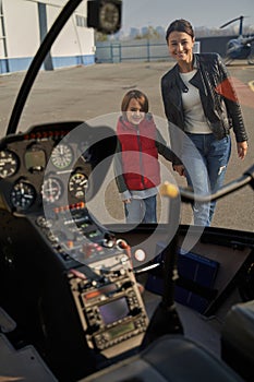 Animated mother and little boy looking at an airplane