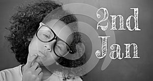 Animation of 2nd jan text over happy african american schoolgirl on grey background