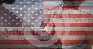 Animation of American flag waving constitution text on mixed race woman