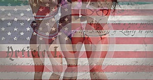 Animation of American flag waving on constitution text multi ethnic female