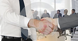 Animation of businessmen shaking hands over businesspeople and cityscape