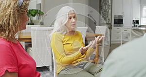 Animation of caucasian senior woman talking during support group meeting