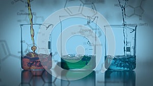 Animation of chemical formula over beakers with colourful liquid