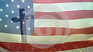 Animation of christian cross and grass over waving flag of usa