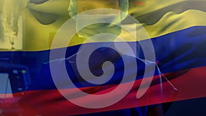 Animation of colombia flag over portrait of caucasian female surgeon in surgical mask at hospital