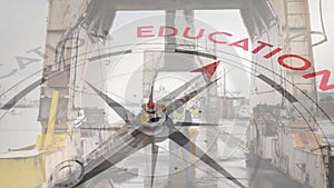 Animation of compass with arrow pointing to education text over caucasian male worker at dockyard