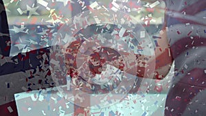 Animation of confetti falling over american flag and businessman handshake