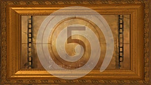 Animation of countdown to midnight in frame on brown background
