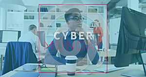 Animation of cyber monday text banner over thoughtful african american man using computer at office
