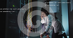 Animation of data processing over african american female engineer using laptop at server room