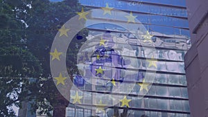 Animation of european union flag and map with mathematical equations against modern buildings