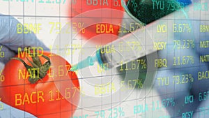 Animation of financial data processing over syringe with needle piercing tomato