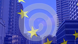 Animation of flag of european union over high rise buildings in modern cityscape