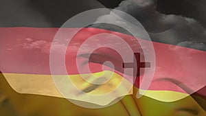 Animation of flag of germany over cross