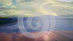 Animation of flag of rusia blowing over beach seascape