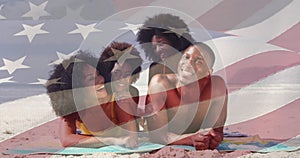 Animation of flag of united states of america over happy senior african american family on beach