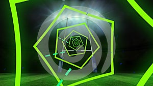 Animation of glowing green spiral and lines over rugby goal on floodlit pitch