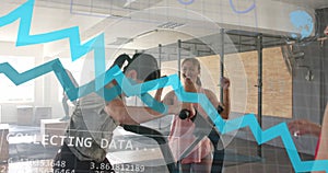 Animation of graph processing data over caucasian woman on elliptical cheered by friends at gym