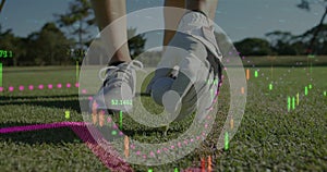Animation of graphs and numbers over low section of caucasian woman placing golf ball on tee