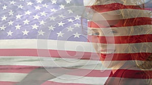 Animation of happy caucasian woman by sea over flag of usa