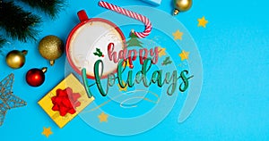 Animation of happy holidays christmas text and decorations on blue background