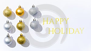 Animation of happy holidays christmas text over decorations on green background