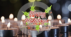 Animation of happy holidays text over lit tea candles background