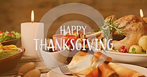 Animation of happy thanksgiving over dinner food background