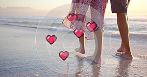 Animation of hearts moving over legs of diverse couple in love on beach in summer