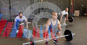 Animation of interface processing data over diverse male group lifting barbell weights at gym